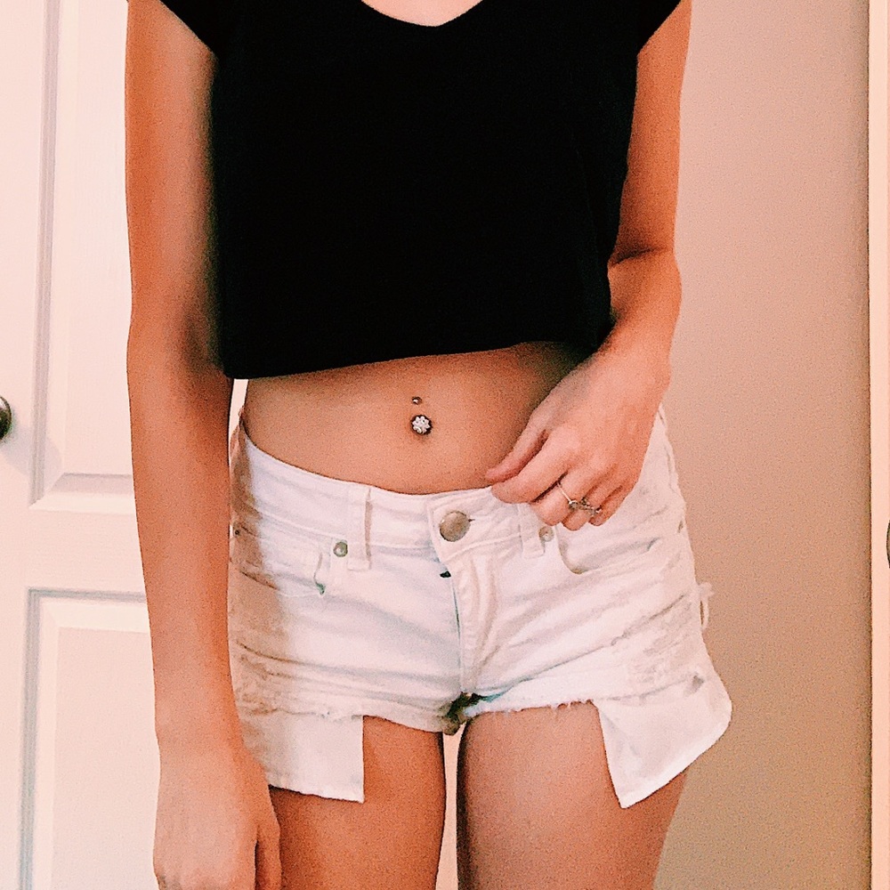 white ripped jean shorts